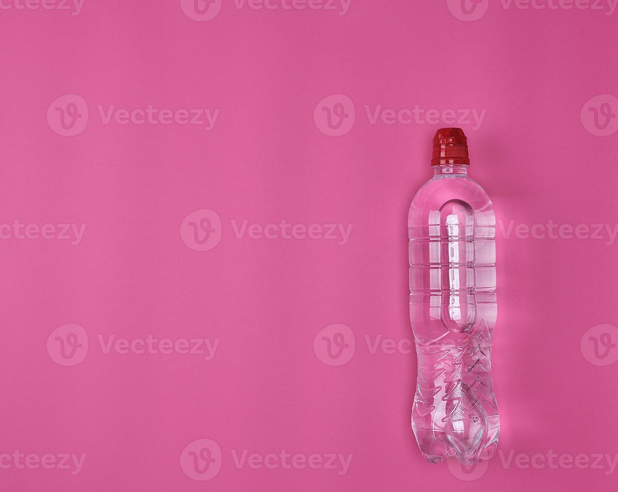 transparent plastic bottle with fresh water photo