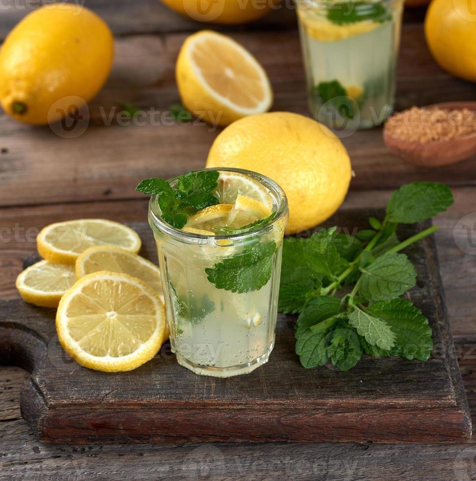 summer refreshing drink lemonade with lemons photo