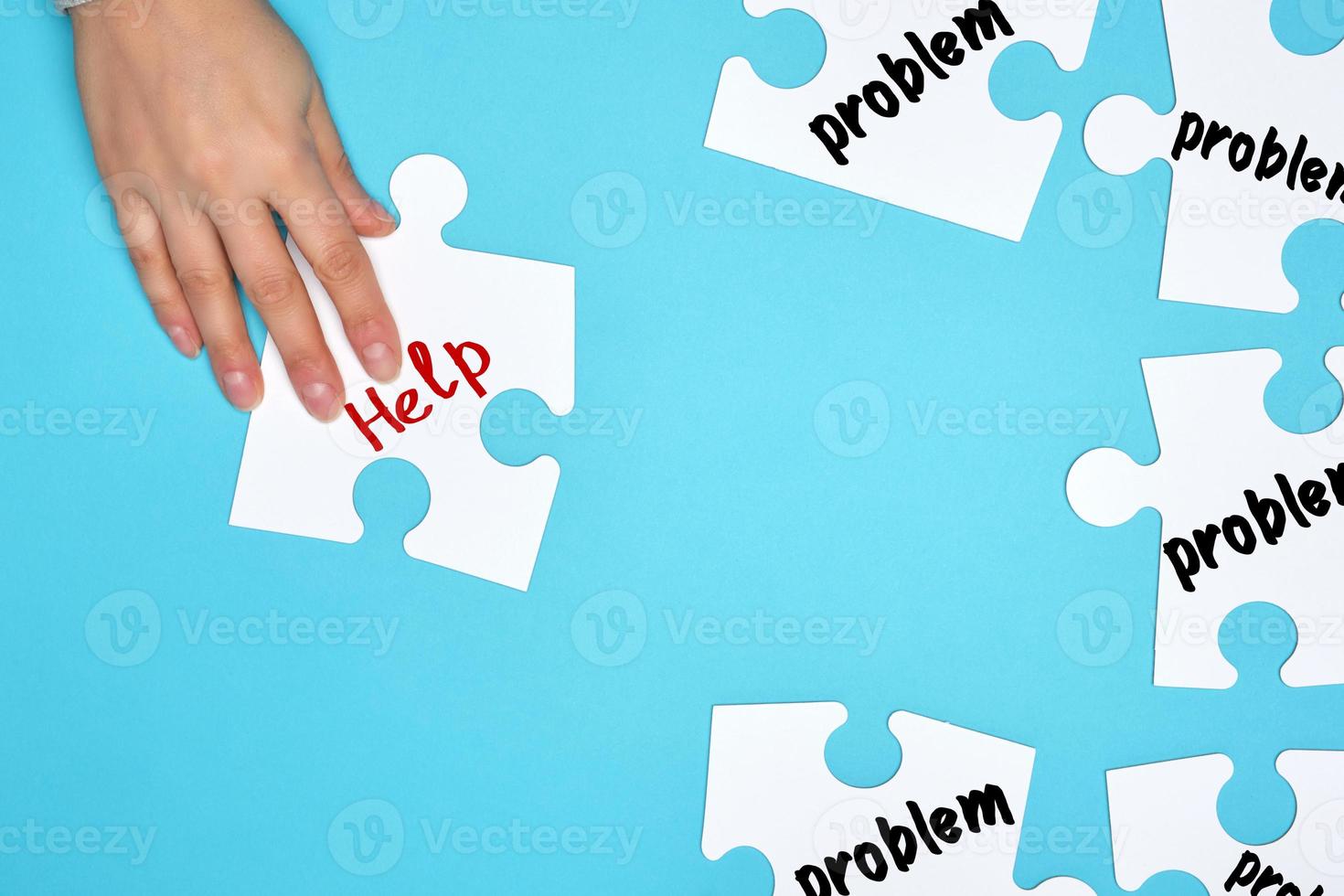 white big blank puzzles on a blue background photo