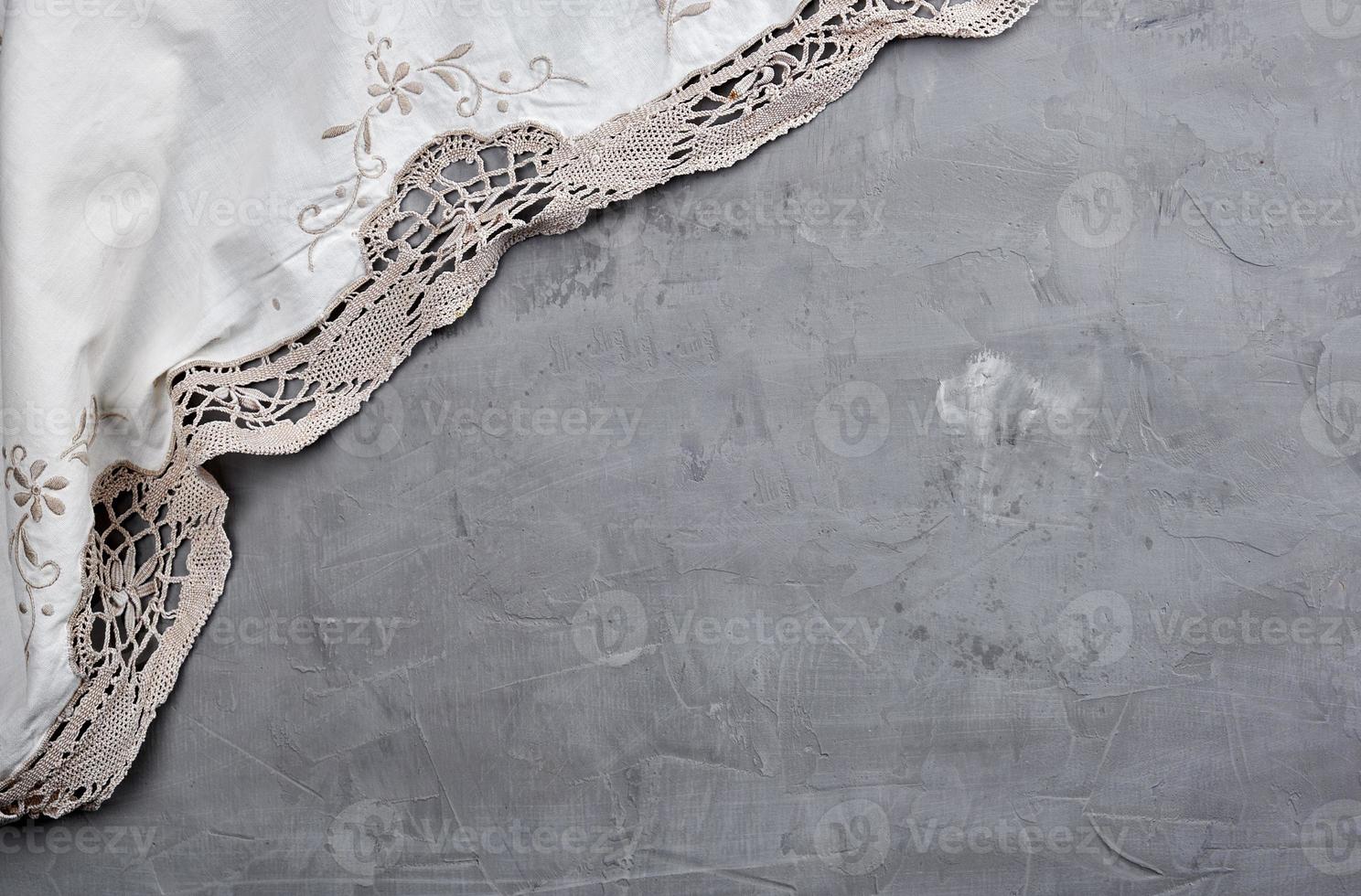 textile kitchen towel on gray cement background photo