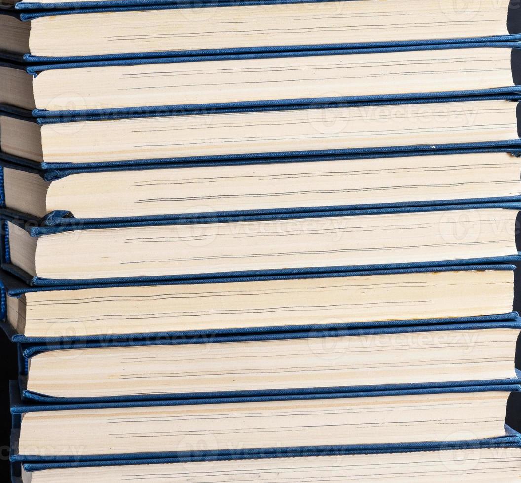 stack of books in a blue cover photo