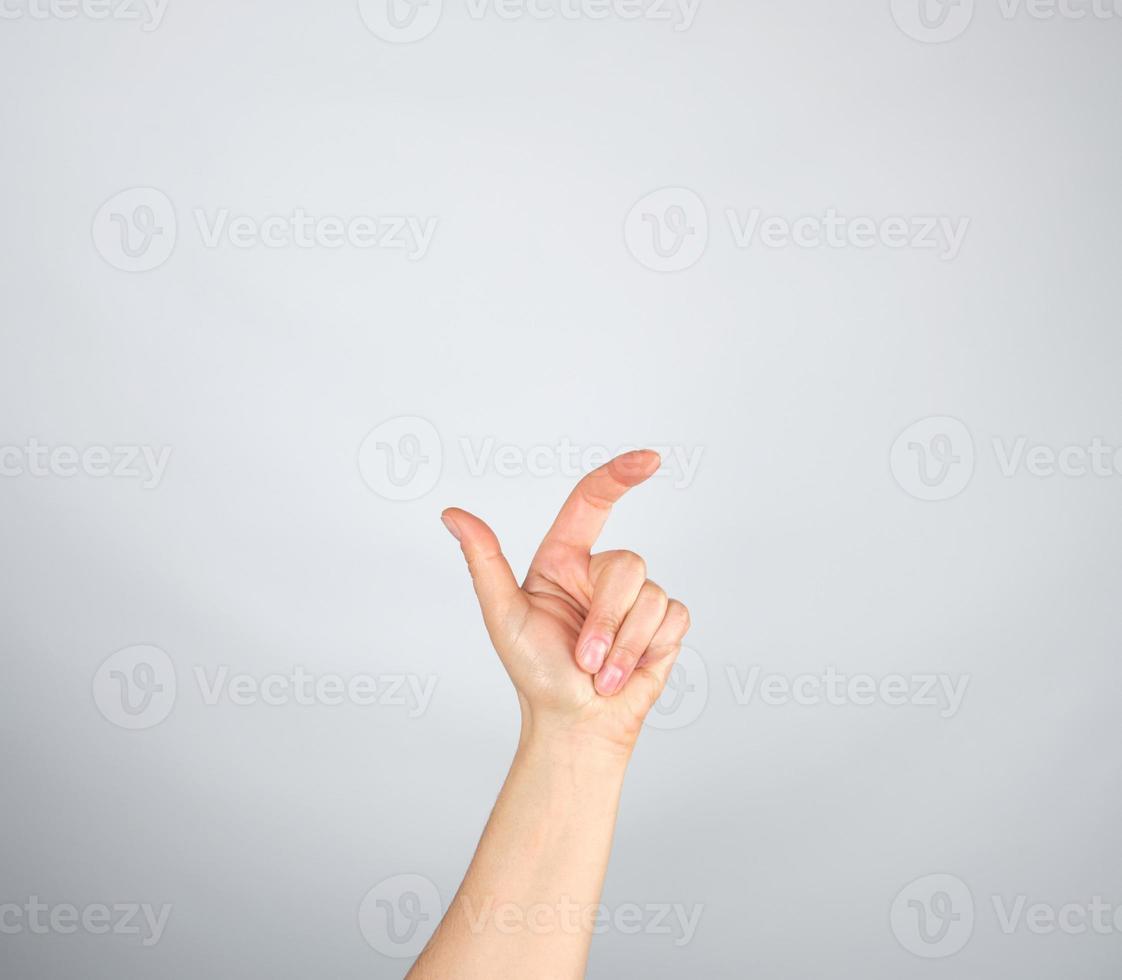 left hand with curled fingers photo