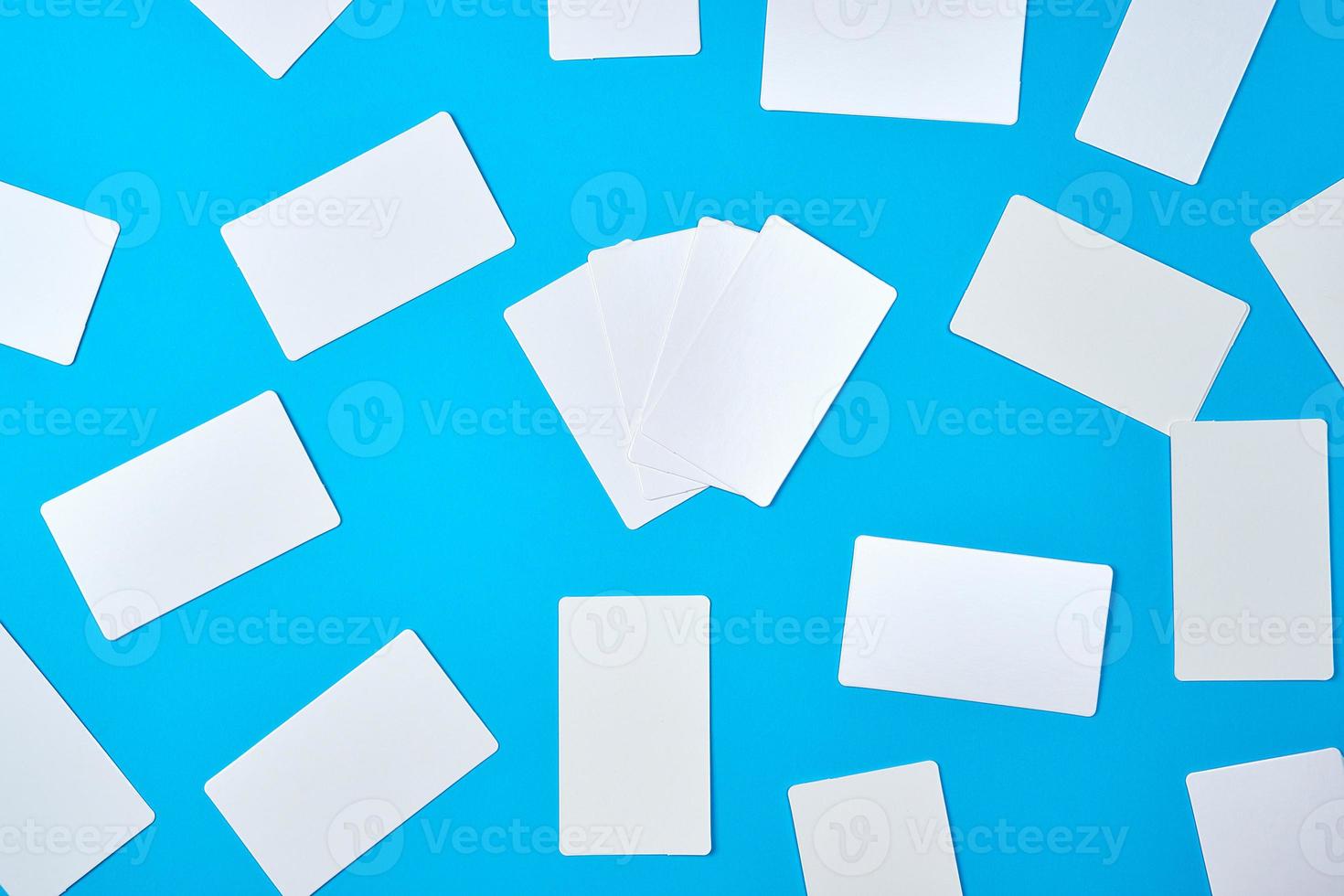 many empty rectangular white paper business cards photo