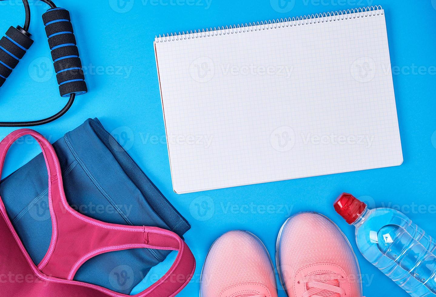 open notebook with blank white sheets, sportswear photo