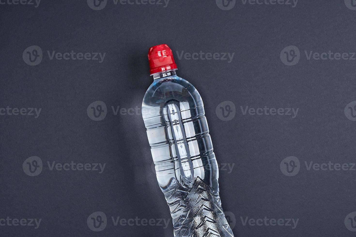 transparent plastic bottle with fresh water photo