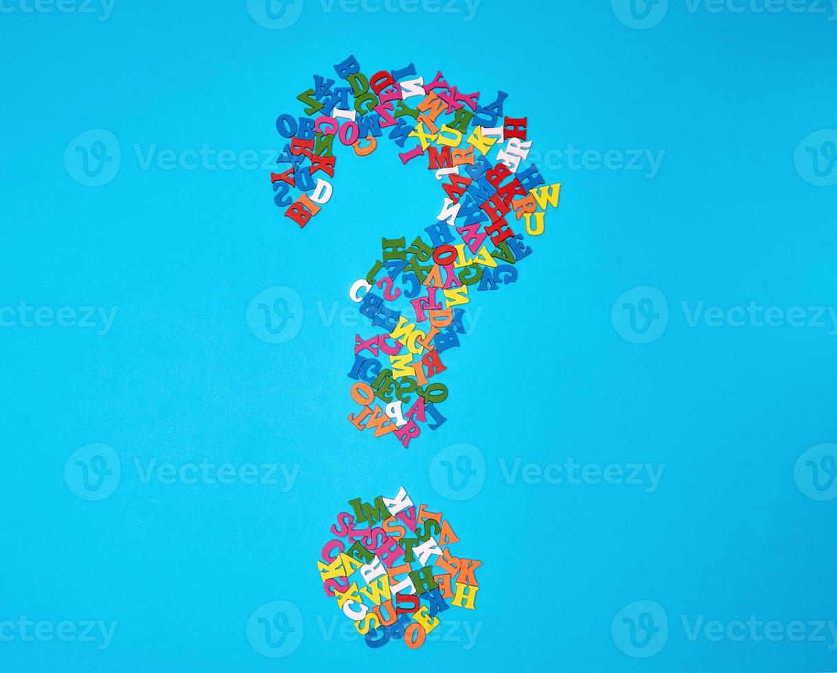question mark figure from small multicolored wooden letters photo
