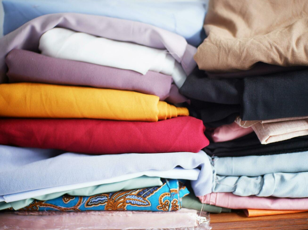 Clothes folded in the closet photo