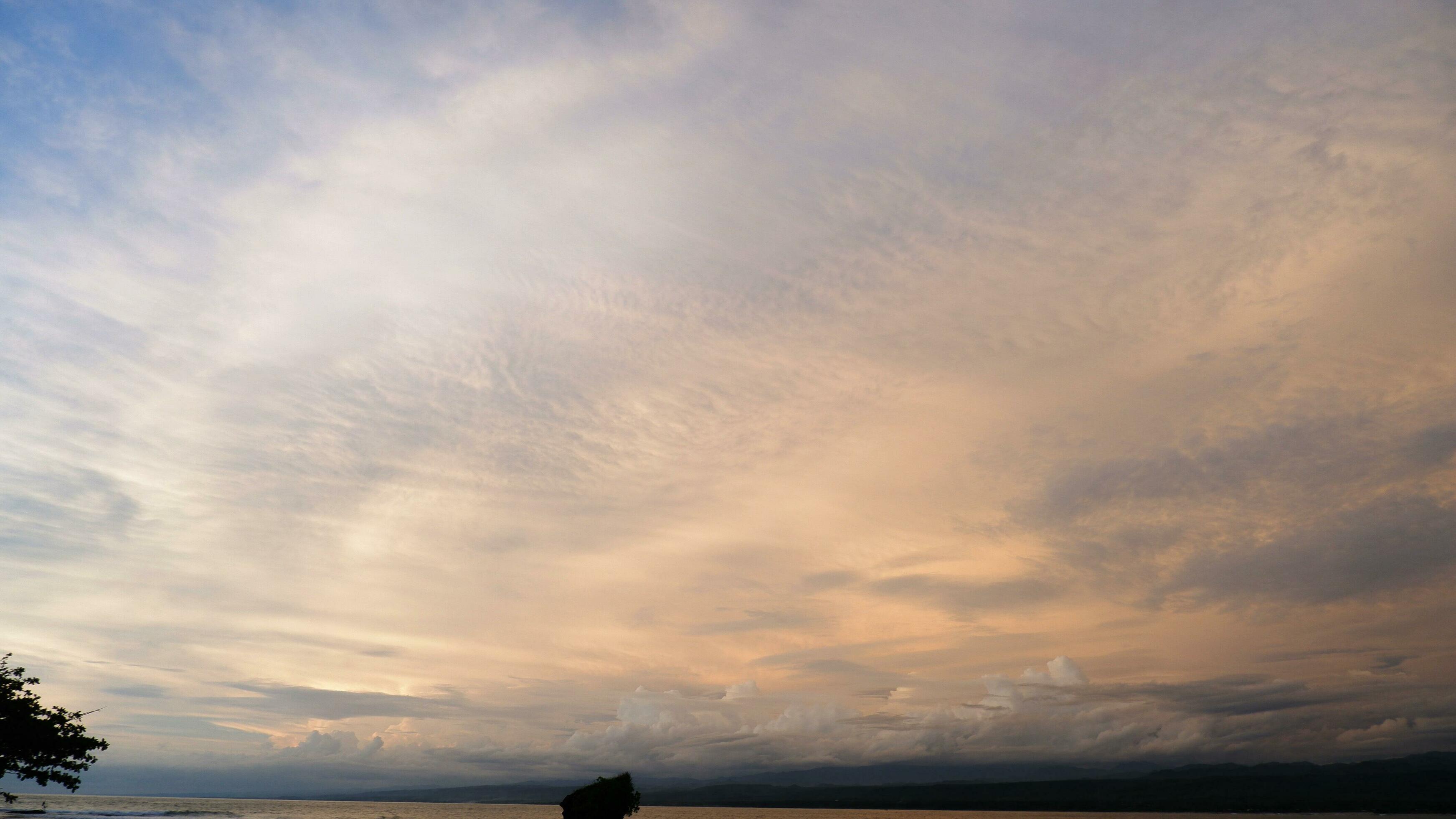 Fiery orange sunset sky. Beautiful sky. Real Panoramic sky sunset over