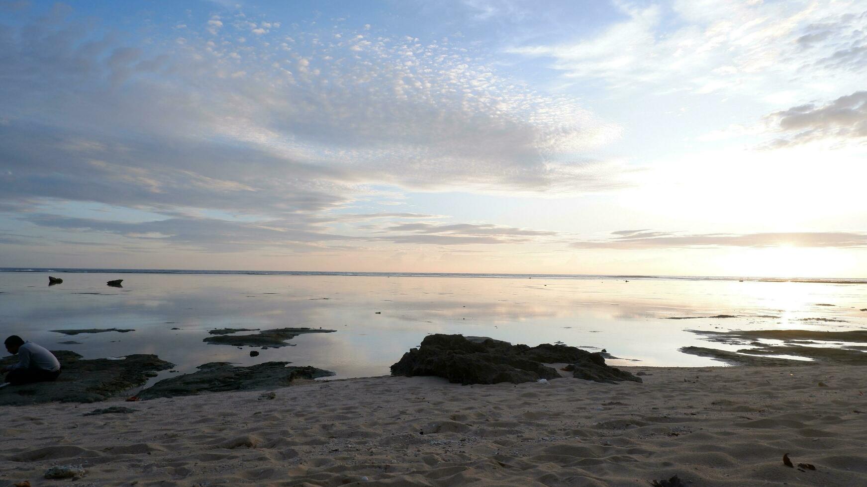Sunset on the beach. Paradise beach. Tropical paradise, white sand, beach,  and clear water. Landscape with sea sunset on beach. photo