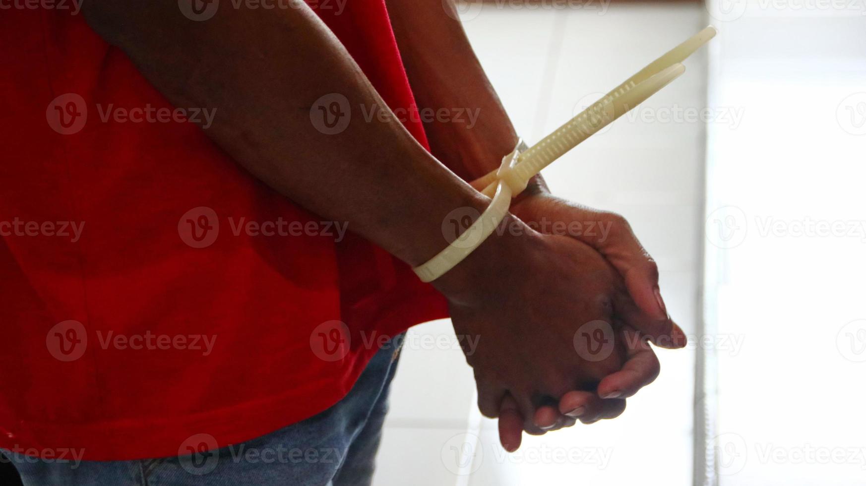 Man handcuffed hands. Prisoner or arrested. photo