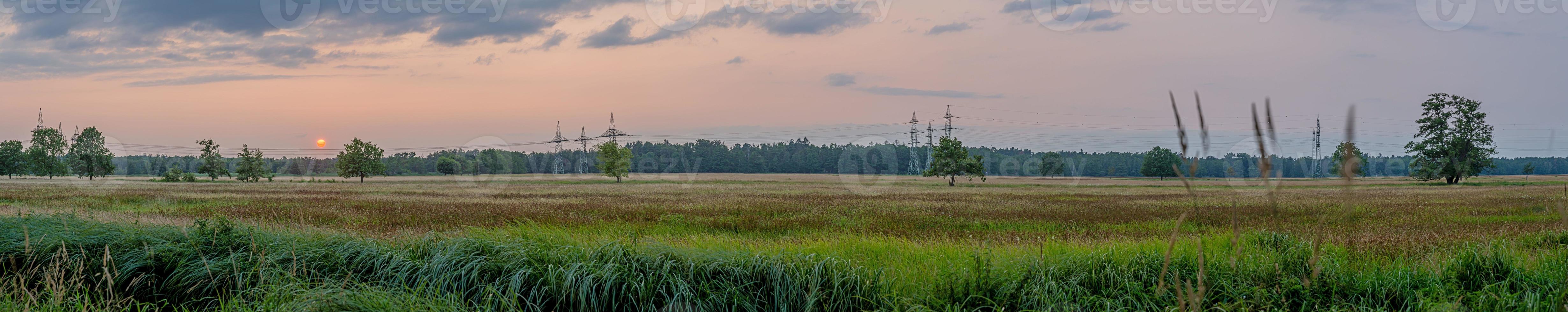 Scene of sunset in Gundwiesen nature reserve near Frankfurt airport photo