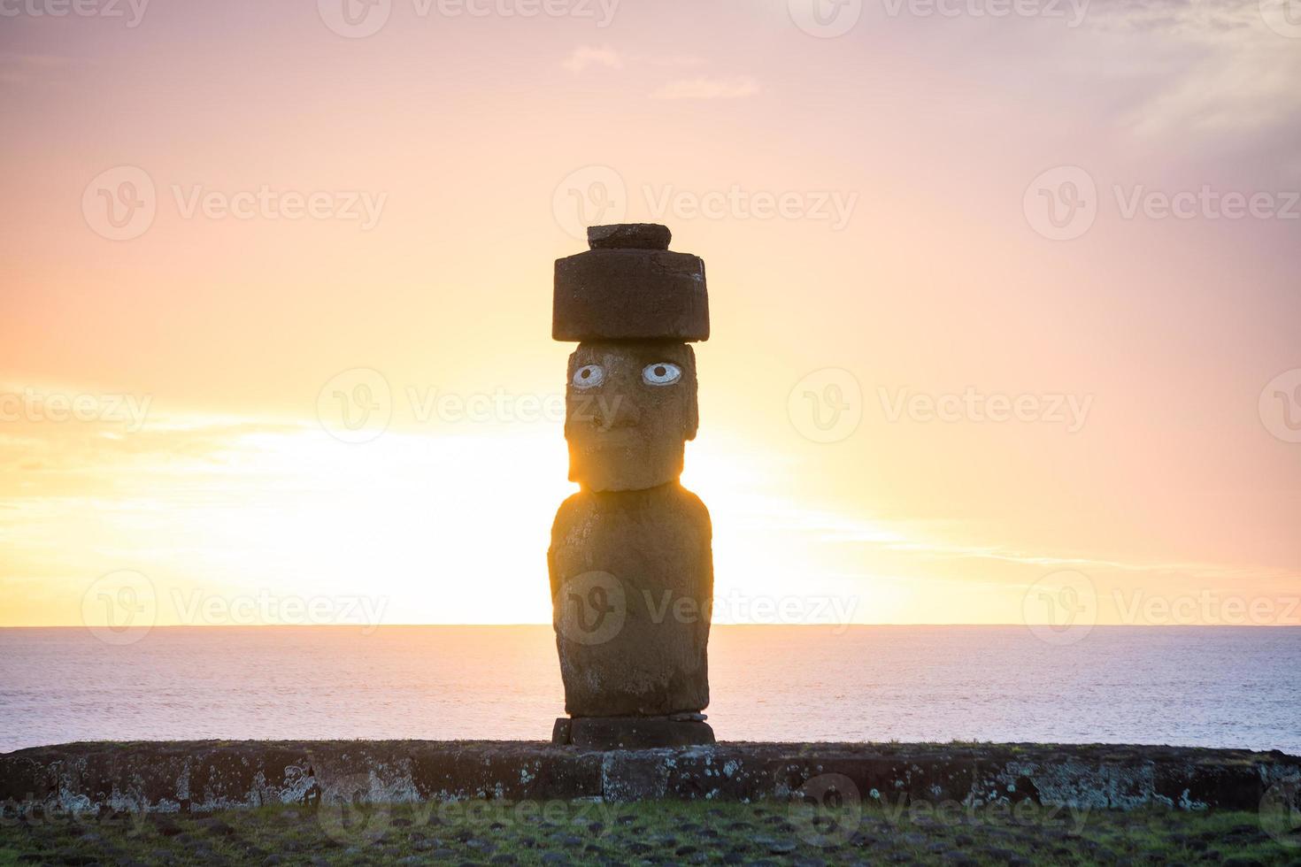 Silhouette shot of Moai statues in Easter Island photo