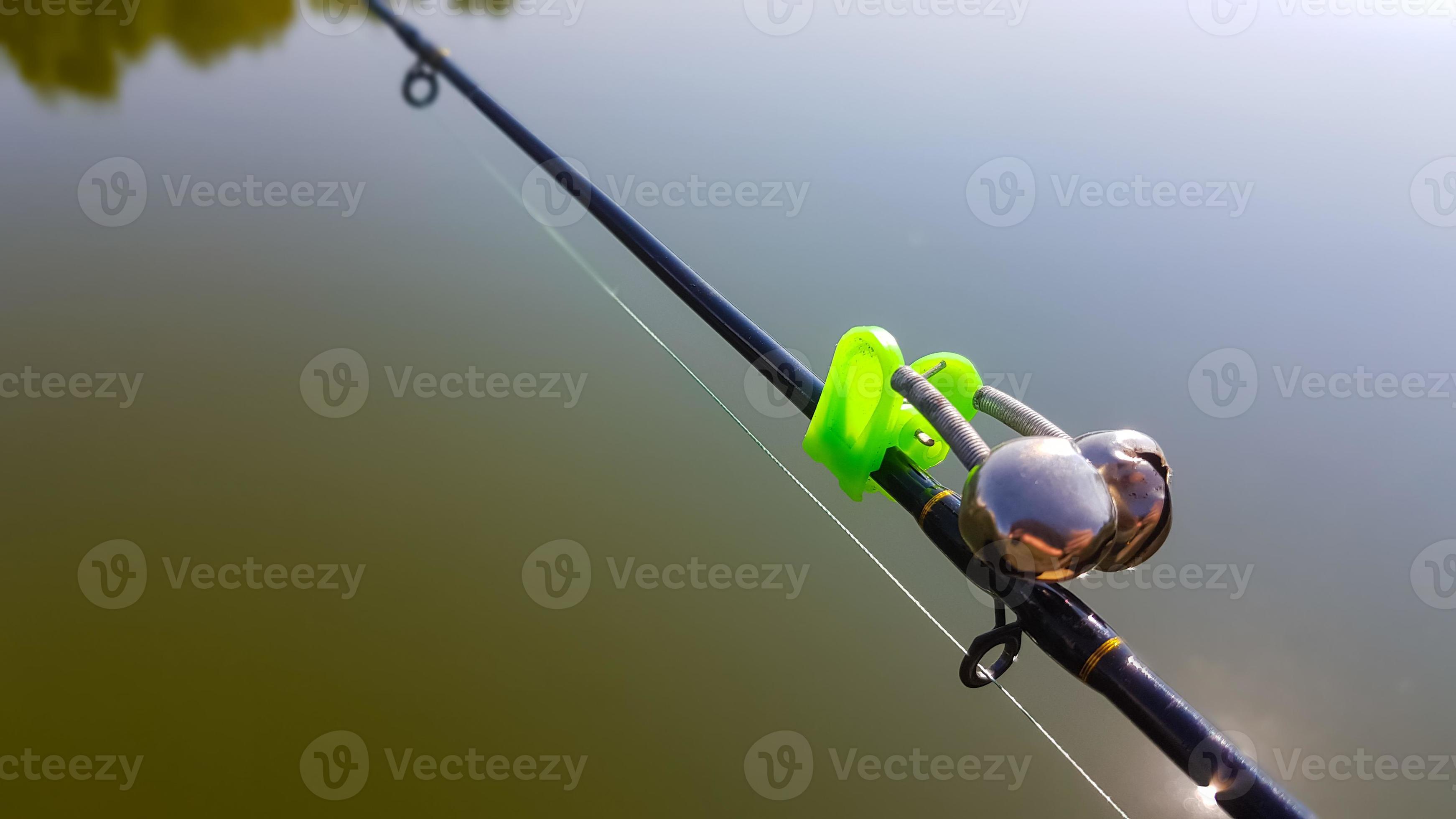 Swing fishing. Rods for carp fishing with a signaling close-up. Kind of  pod. Fishing for carp on the background of the lake. The fisherman catches  carp. 19470343 Stock Photo at Vecteezy