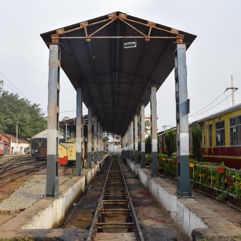 Kalka, Haryana, India May 14 2022 - View of Toy train Railway Tracks from the middle during daytime near Kalka railway station in India, Toy train track view, Indian Railway junction, Heavy industry photo