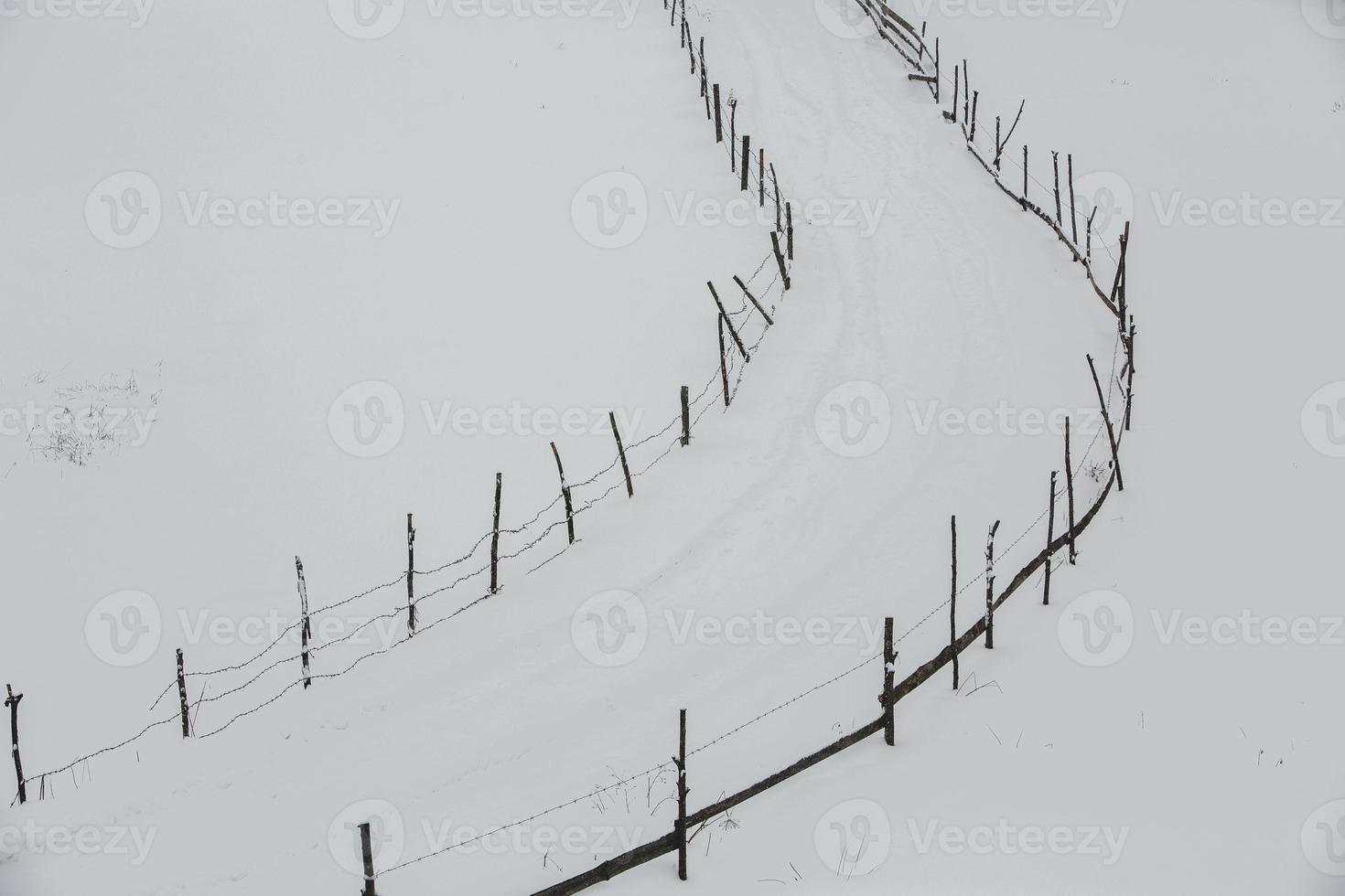 An abundant snowfall in the Romanian Carpathians in the village of Sirnea, Brasov. Real winter with snow in the country photo