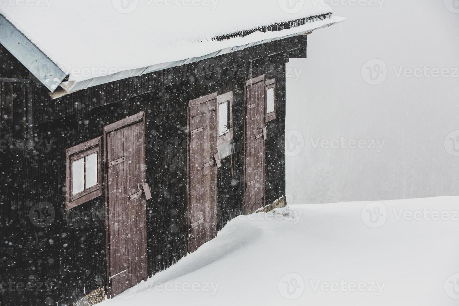 An abundant snowfall in the Romanian Carpathians in the village of Sirnea, Brasov. Real winter with snow in the country photo