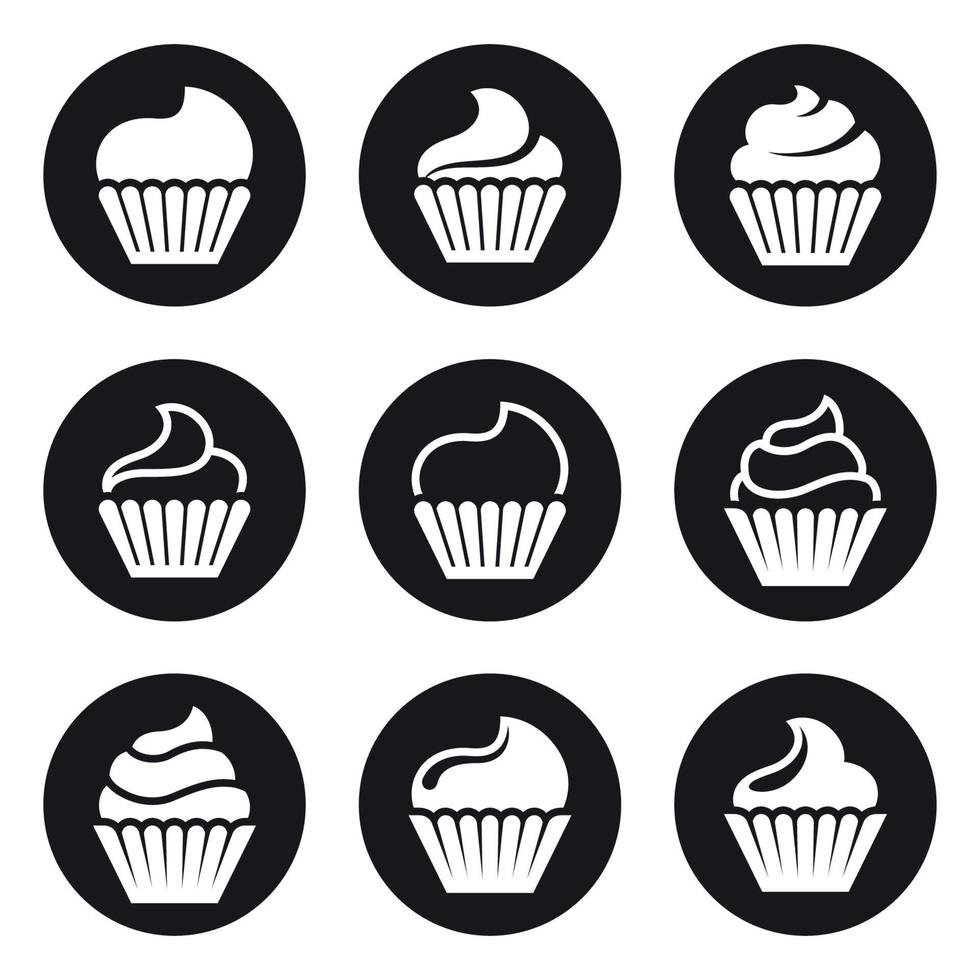 Cupcakes icons. White on a black background vector