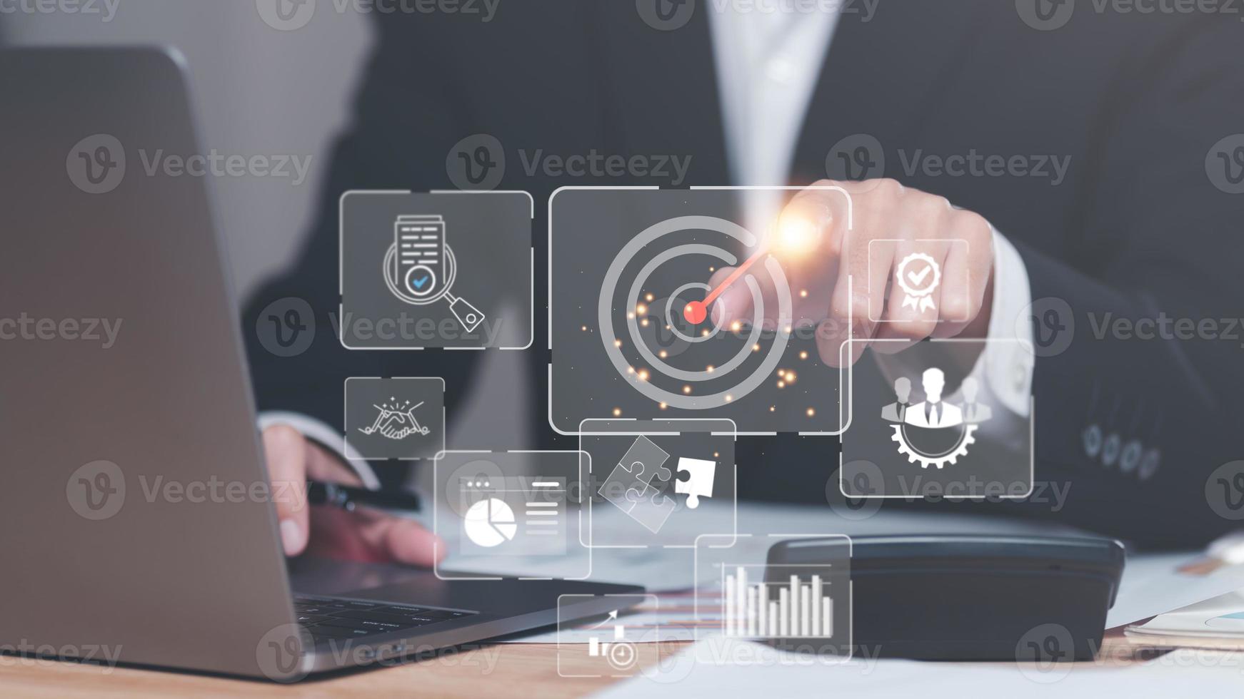 businessman pointing icon, arrow icon hitting center of dartboard target,Setting business goals and focused concepts, Organizational growth and objectives, marketing strategy planning photo