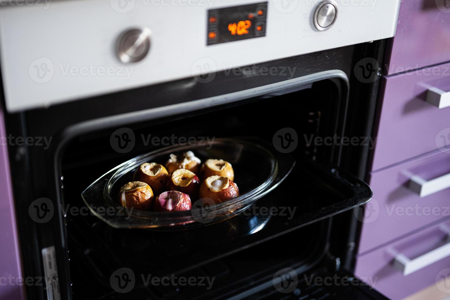 Homemade baked apples in the oven. photo