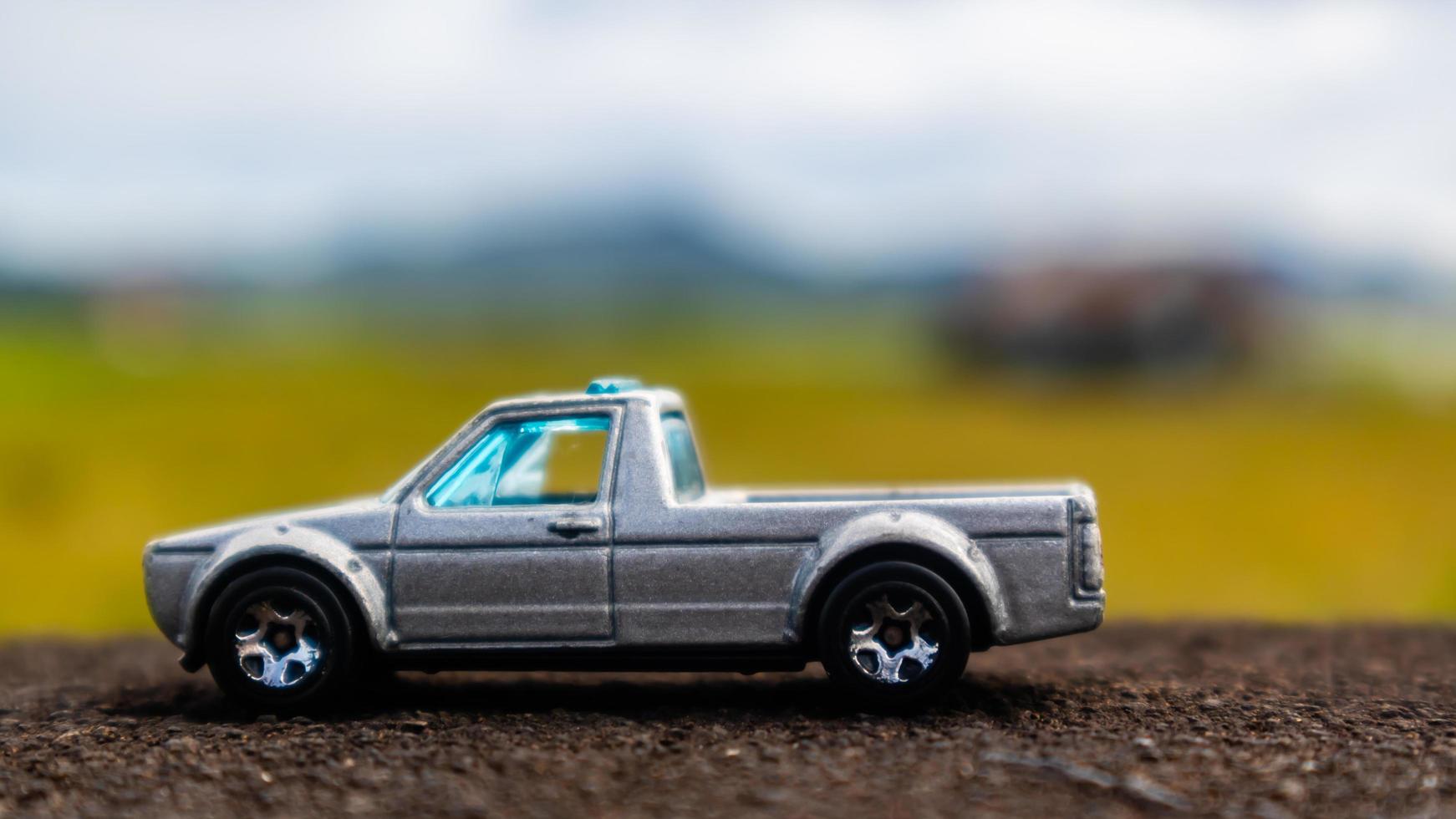 minahasa, Indonesia January 2023, toy car in the rice field photo