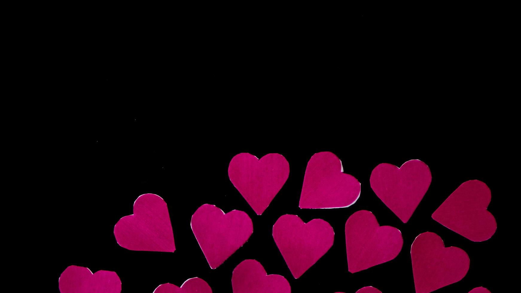 multicolored heart on black background for valentine's day photo
