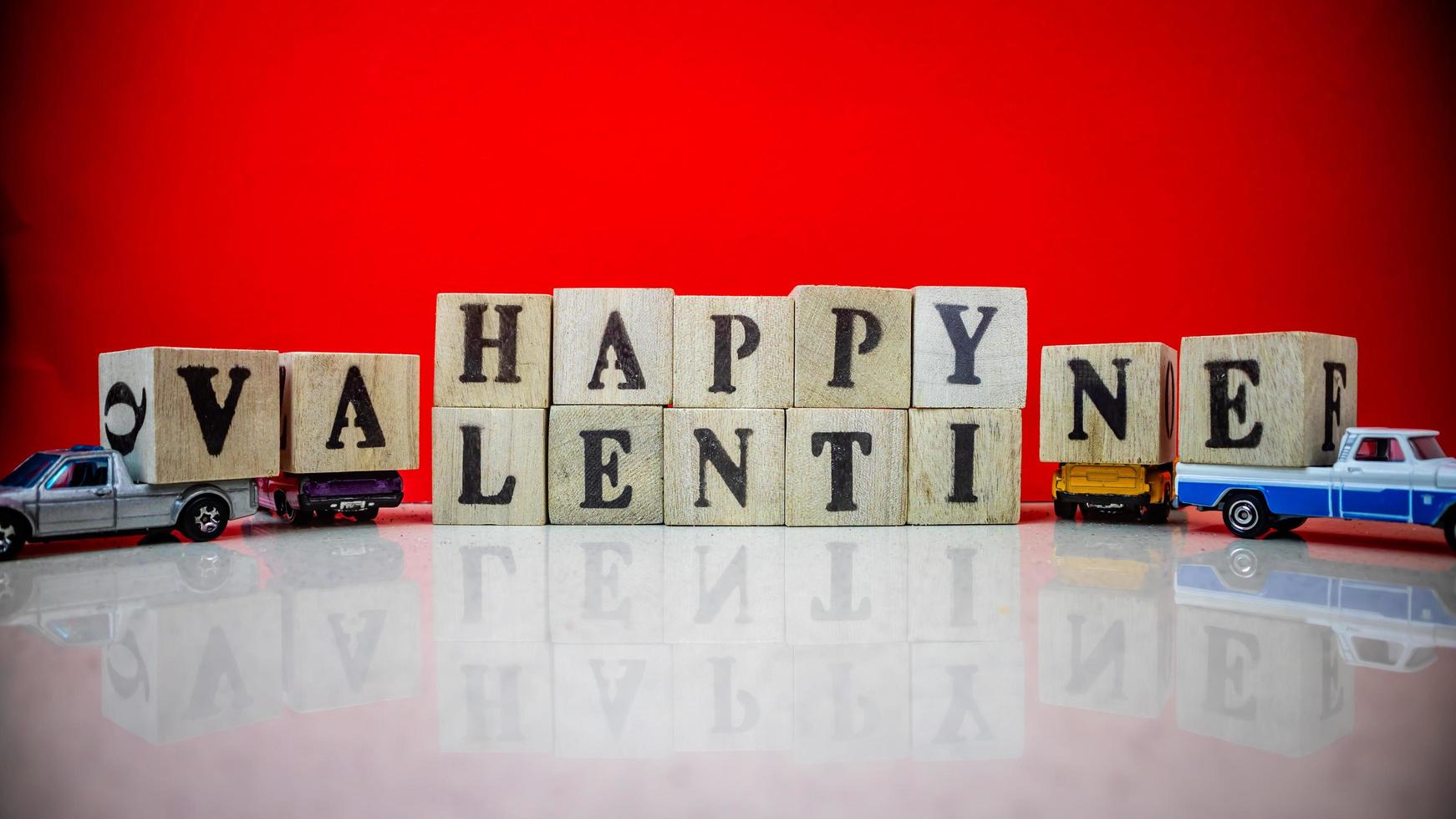 minahasa, Indonesia  January 2023, Happy valentine's day from stacked wooden blocks photo