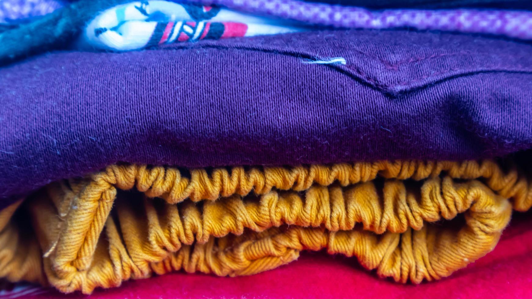 stack of clothes as background photo