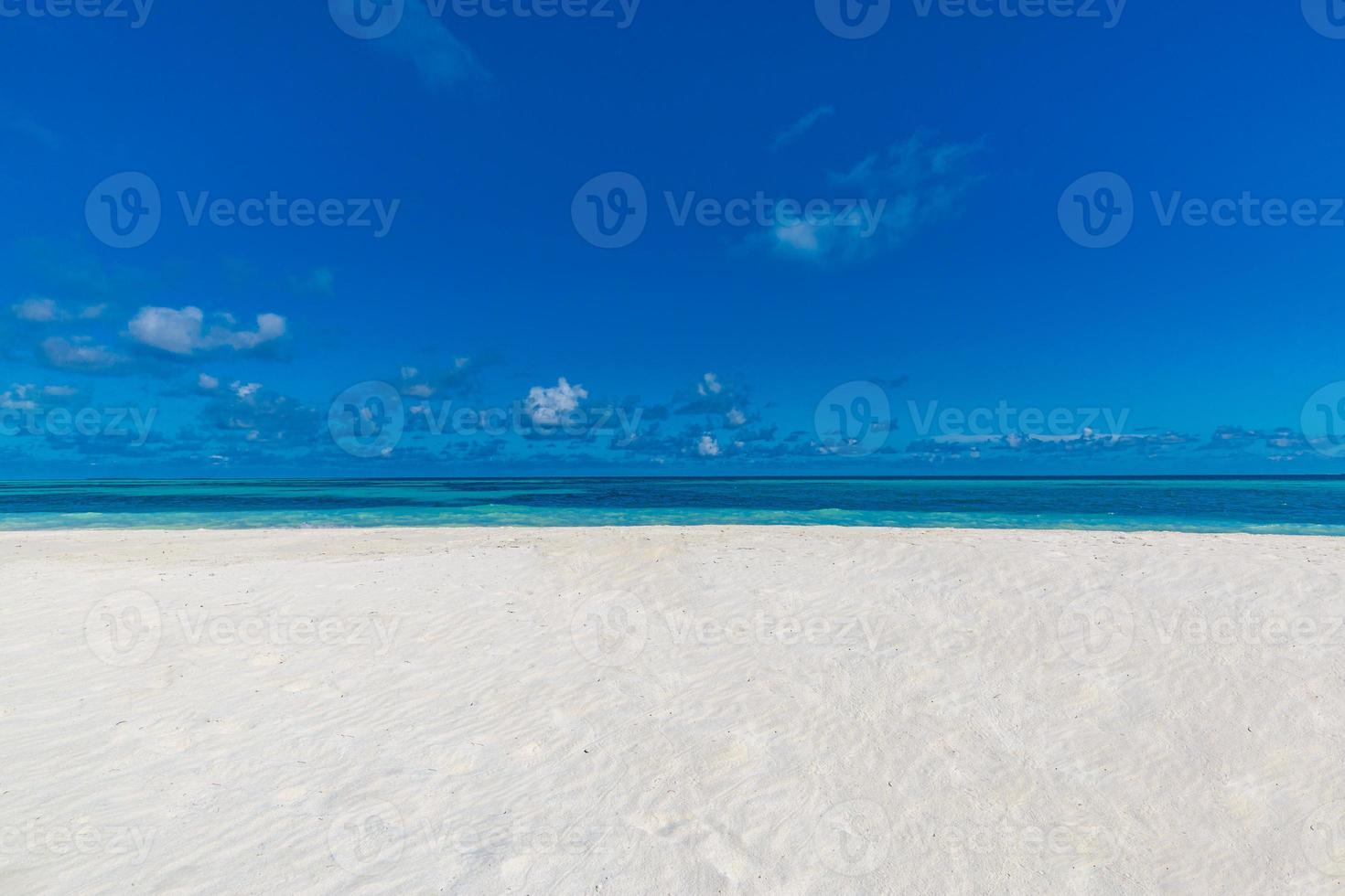 Sea sand sky conceptual background with copy space for text. Summer beach view, white sand, blue sky. Idyllic summer landscape for recreational and inspirational template photo