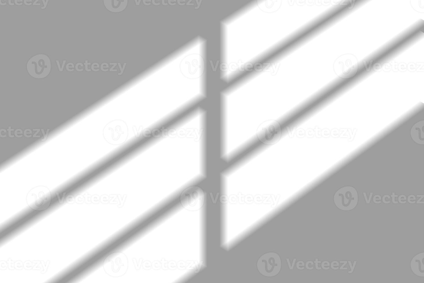 blur background. Abstract shadow of the window in morning light on white wall texture photo