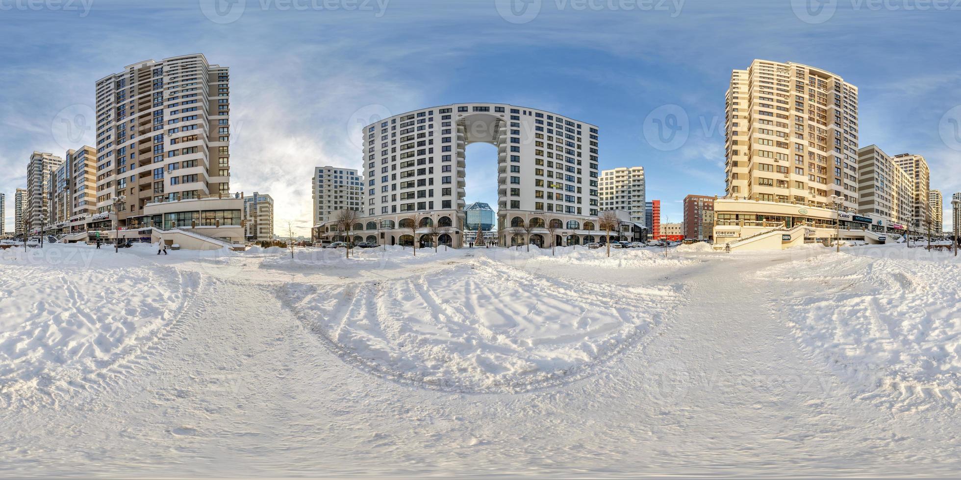 full seamless spherical winter hdri panorama 360 near skyscraper multistory buildings of residential quarter with snow in equirectangular projection photo