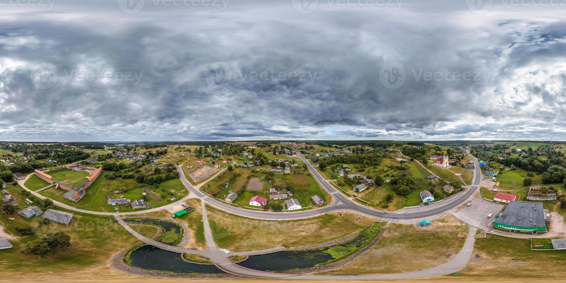 aerial full seamless spherical hdri 360 panorama view above green village with private development sector with country houses in equirectangular projection.  use like sky replacement for drone shots photo