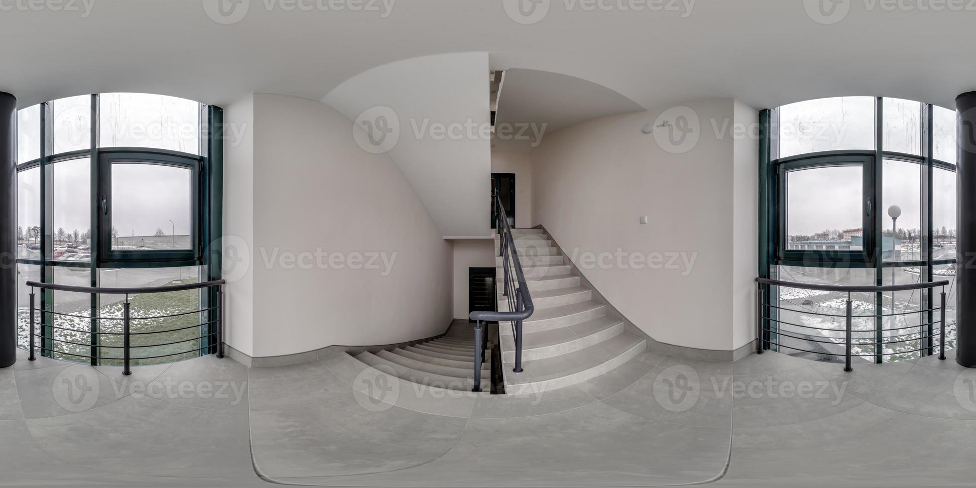 full seamless spherical hdri 360 panorama view in empty modern hall, staircase and panoramic windows in equirectangular projection, ready for AR VR content photo