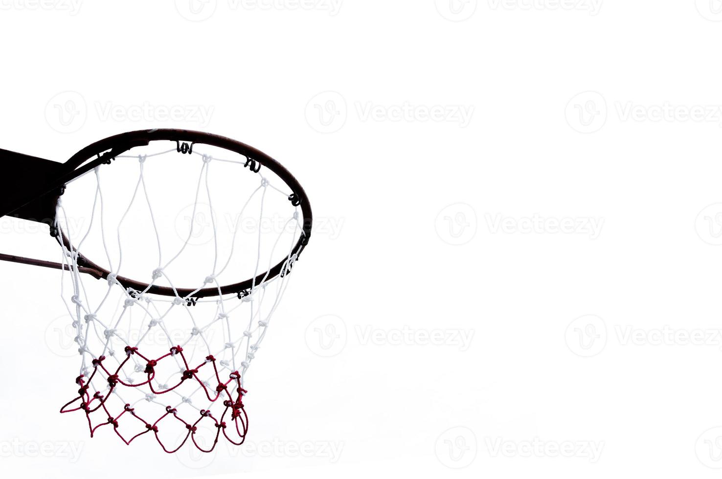 Basketball hoop viewed from below on white background photo