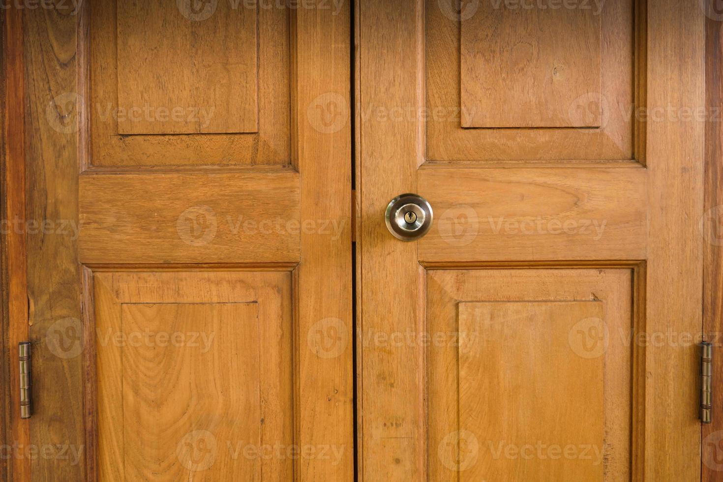 Lock on wood door,wood door entrance of residential house photo