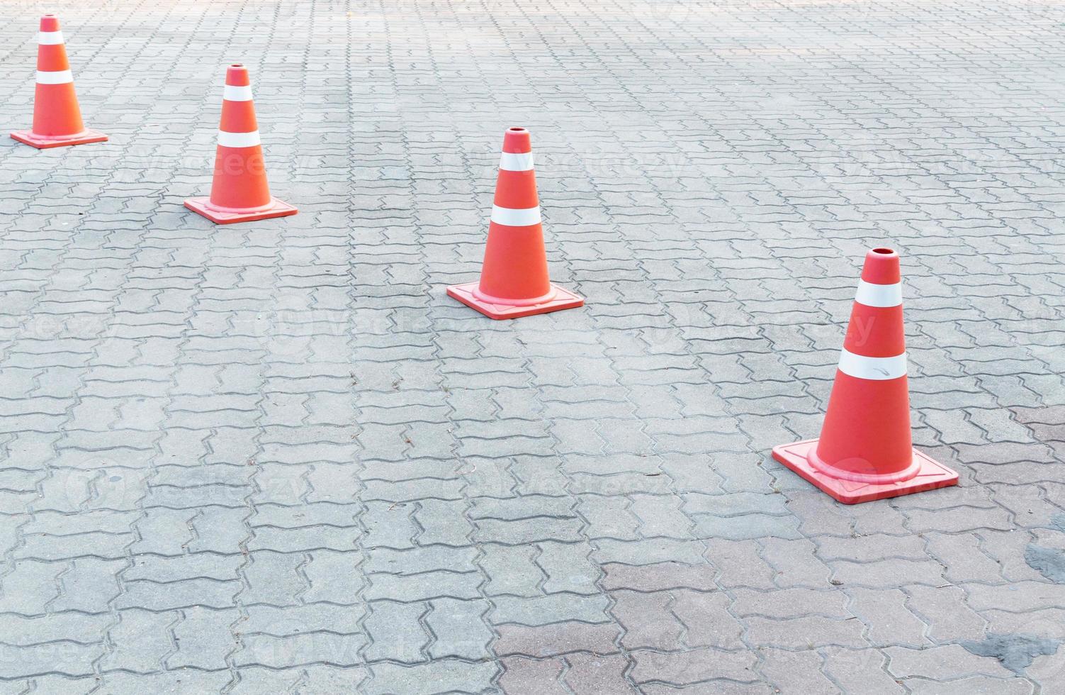 Traffic cone on the road photo