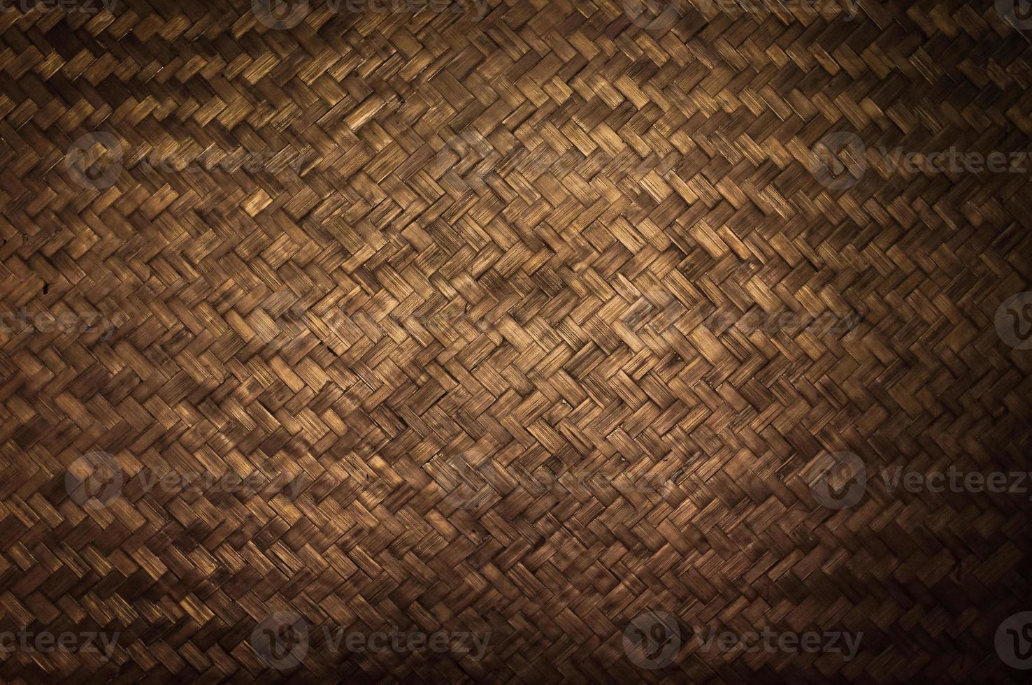 Dark Texture of bamboo handicraft detail , Pattern of Thai style bamboo handcraft texture background , vintage wall photo