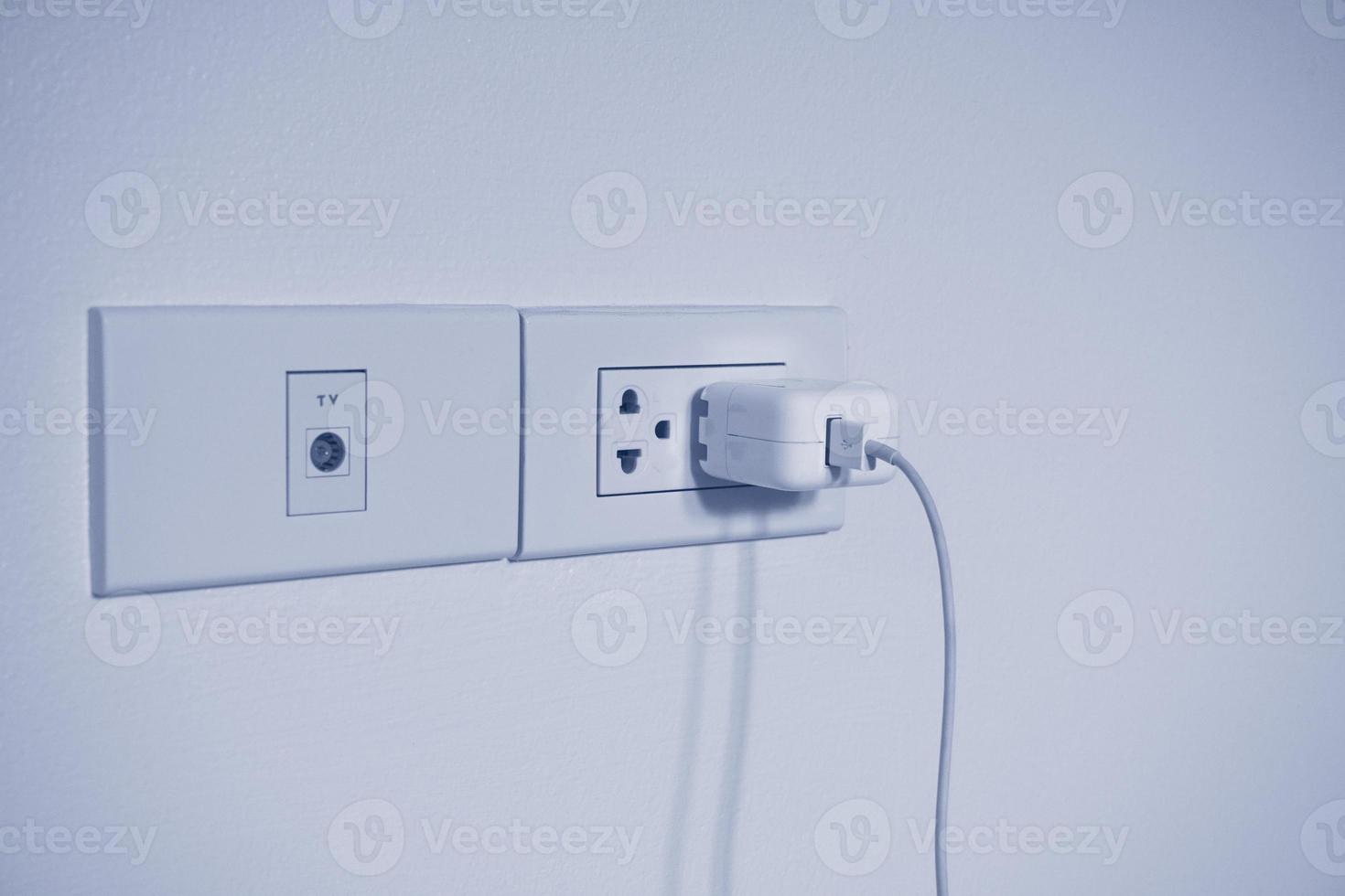 Outlet and USB power adapter,New wall outlet socket . For convenience, the mobile charger or smartphone and tv in the concept of modern life. photo