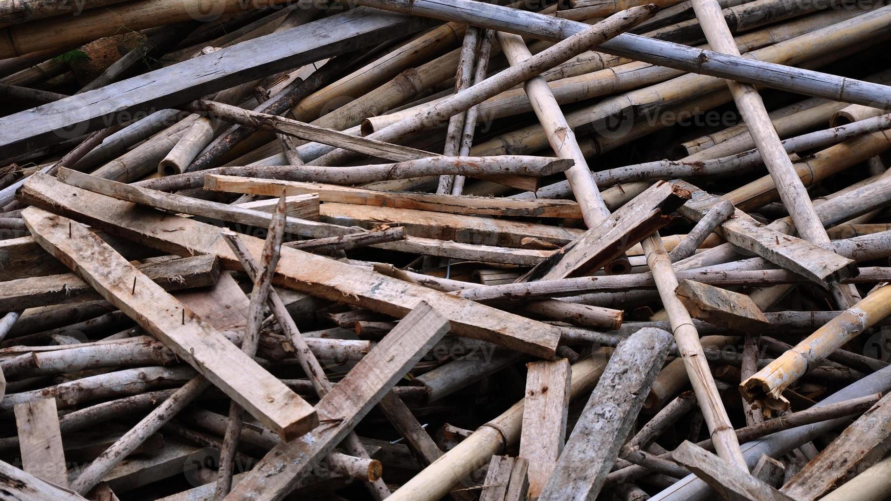 Pile of wood logs for build Furniture production, sew natural wood scraps, ready to recycle and reuse process in improved waste photo