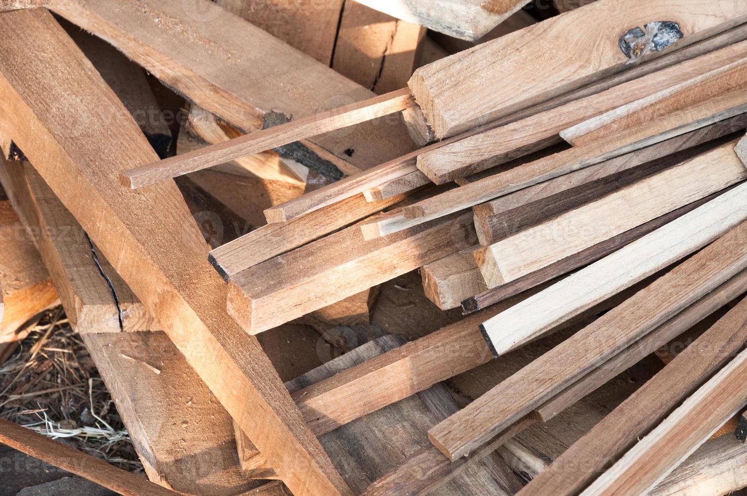 Pile of wood logs for build Furniture production,sew natural wood scraps, ready to recycle and reuse process in improved waste management under efficient sustainable approach to save environment photo