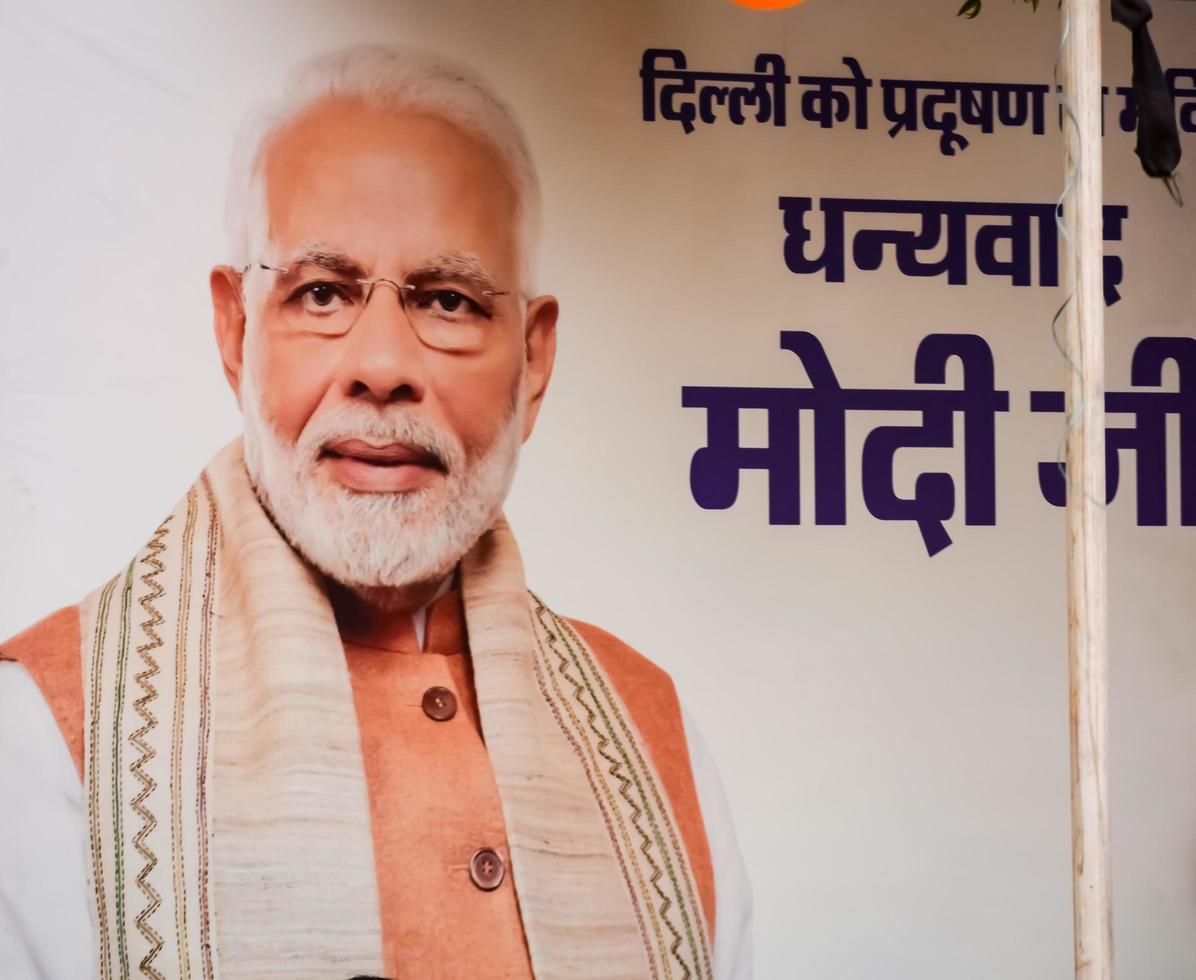 New Delhi, India - January 16 2023 - Prime Minister Narendra Modi cut out during BJP road show, the statue of PM Modi while attending a big election rally in the capital photo