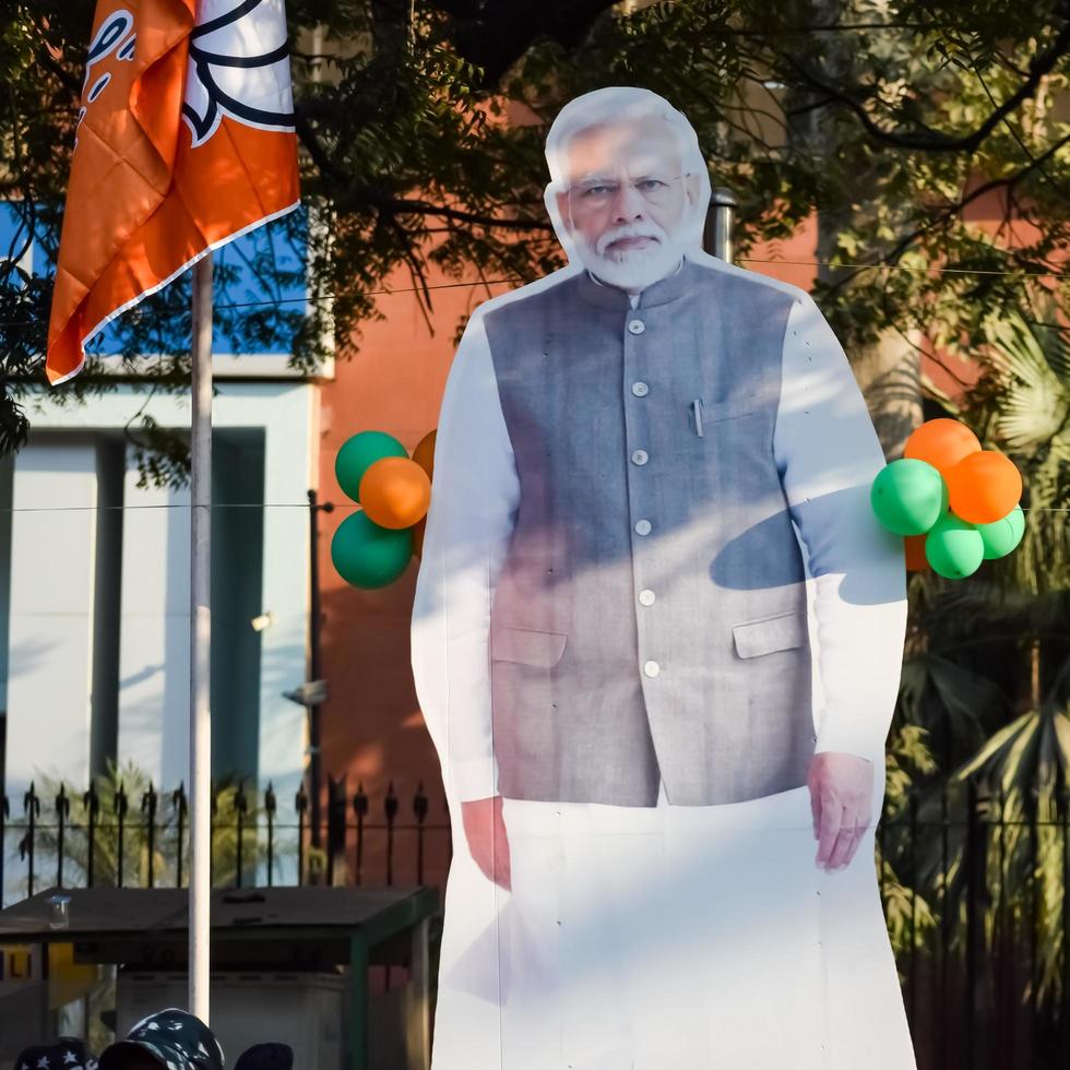 New Delhi, India - January 16 2023 - Prime Minister Narendra Modi cut out during BJP road show, the statue of PM Modi while attending a big election rally in the capital photo