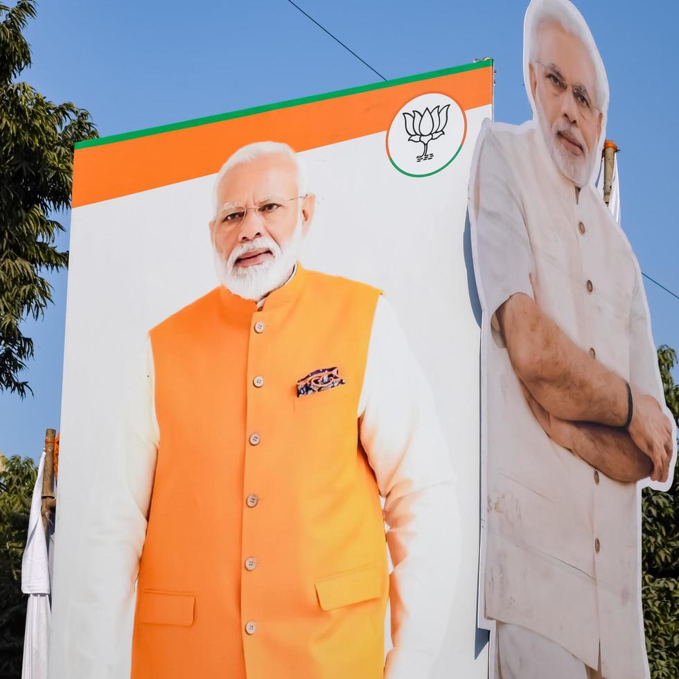 New Delhi, India - January 16 2023 - Prime Minister Narendra Modi cut out during BJP road show, the statue of PM Modi while attending a big election rally in the capital photo