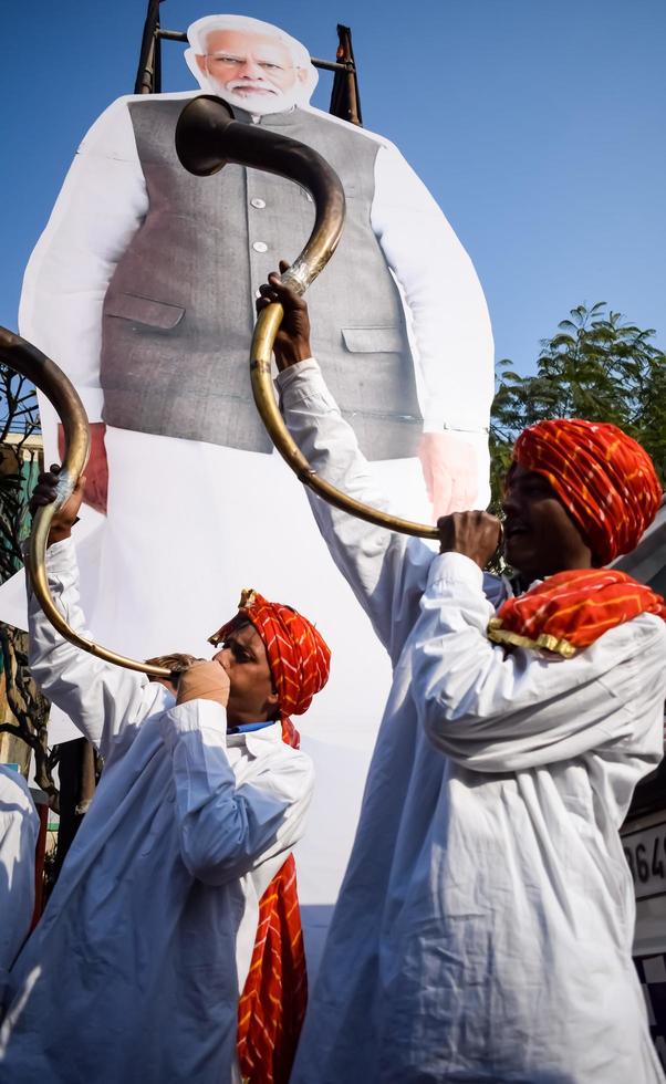 New Delhi, India - January 16 2023 - Prime Minister Narendra Modi cut out during BJP road show, the statue of PM Modi while attending a big election rally in the capital photo