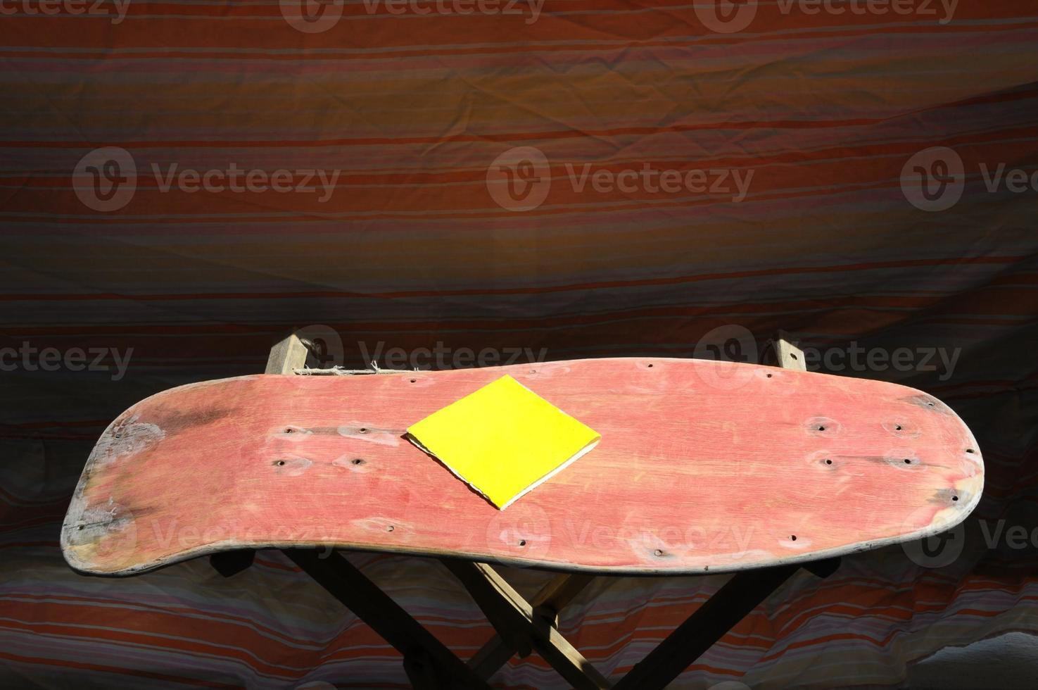 Old wooden skateboard photo