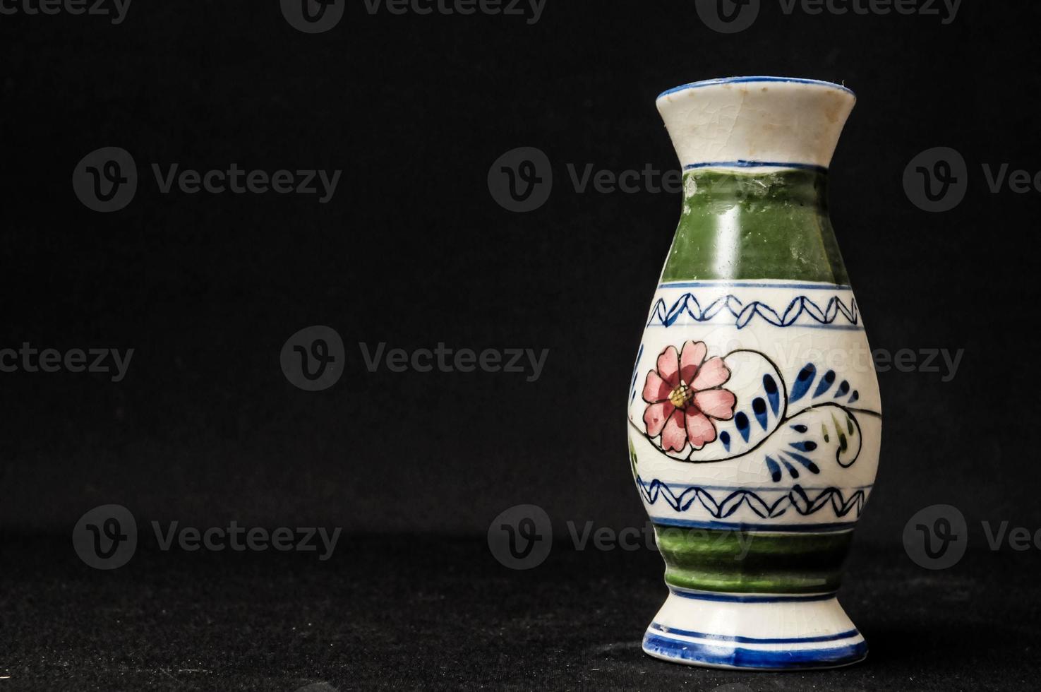 Vase on black background photo