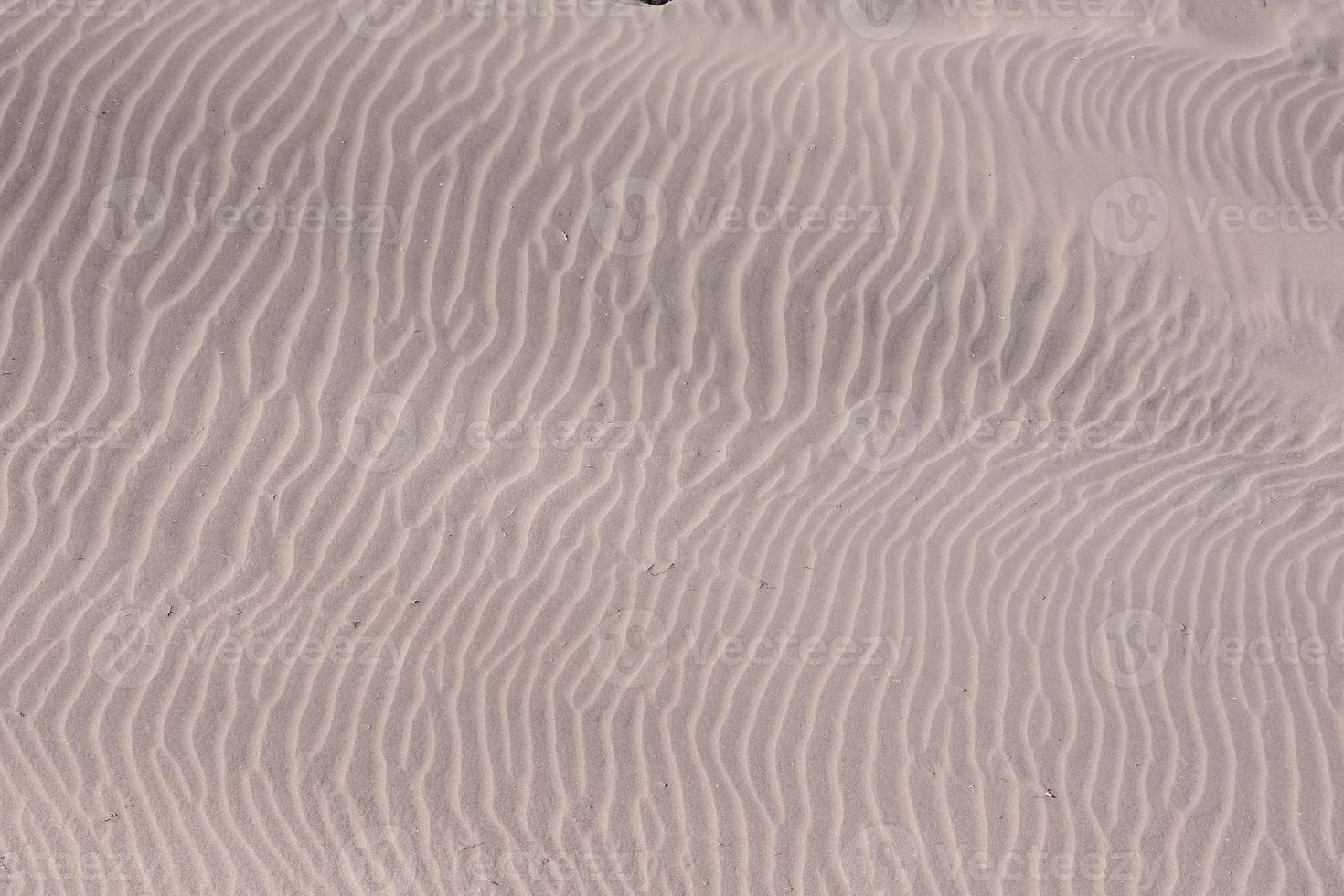 primer plano de arena de playa foto