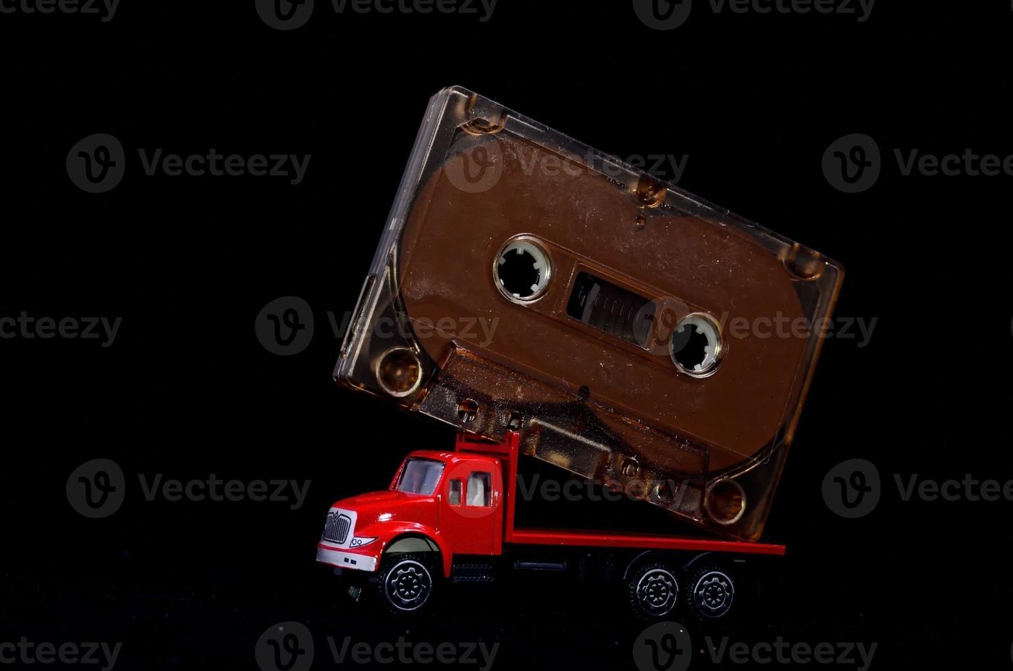 Old cassette tape on a toy truck photo