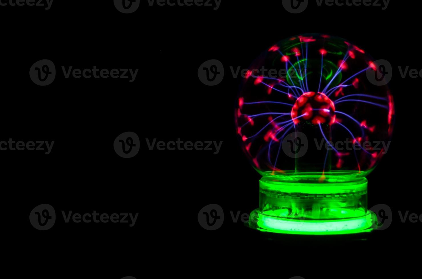 Magic ball on black background photo