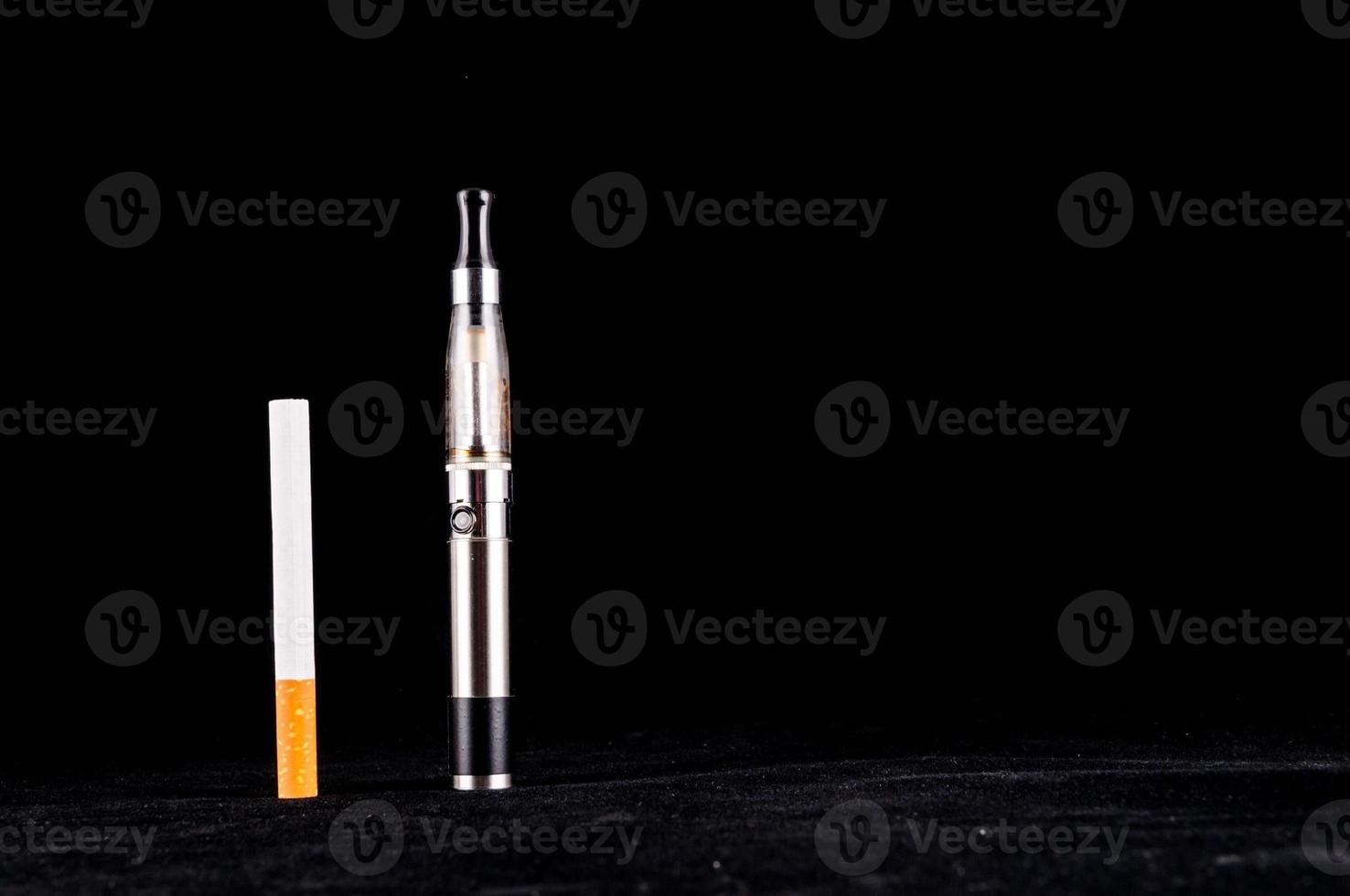 Cigarette on black background photo