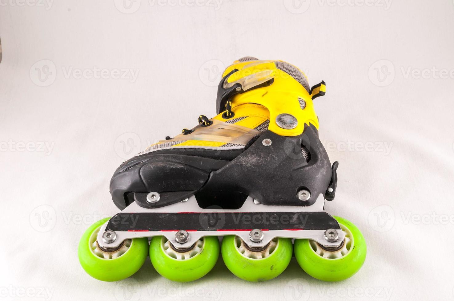 Roller skate on light background photo